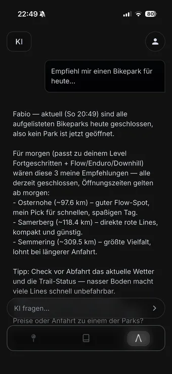 The LQΛL assistant answering a request for a bikepark recommendation: it reports that every listed park is closed today, then names three for tomorrow matched to the rider's advanced level and flow, enduro and downhill preferences, each with its distance.